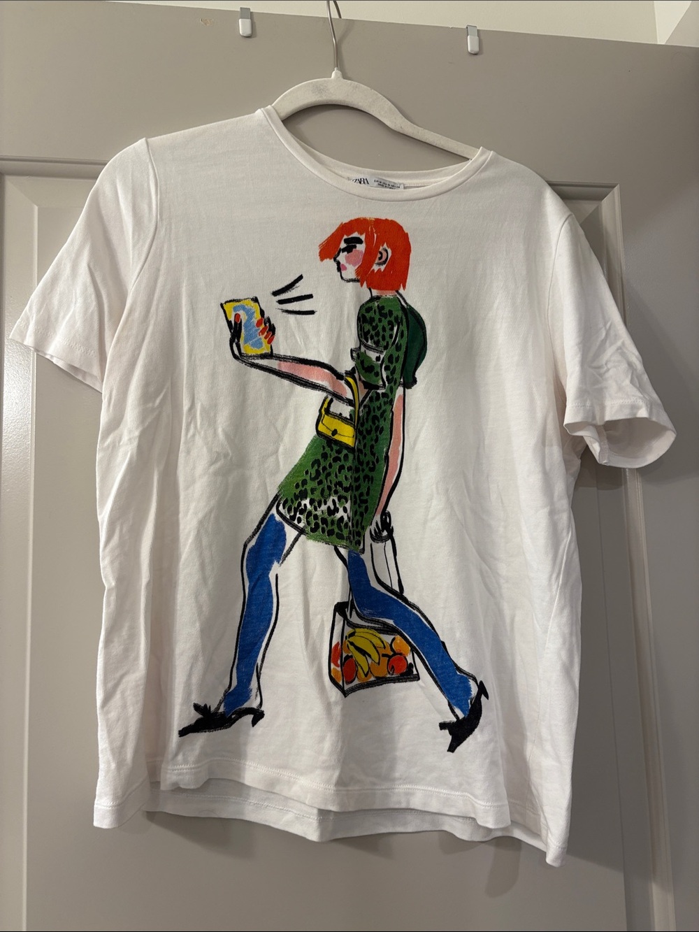 Zara White Graphic Tee with Colorful Walking Woman Illustration